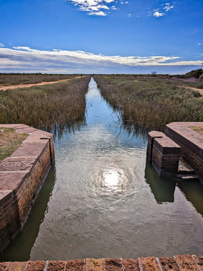 Canal flowing from Fort Pulaski National Monument Tybee Island Savannah Georgia 1